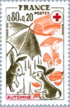 実りの秋、傘の下でおしゃべり中のうさぎ（フランス赤十字、1975年）