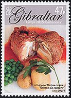 ゆで卵とハムを詰めた子牛の肉料理、バスの焼き物（ジブラルタル、2005年）