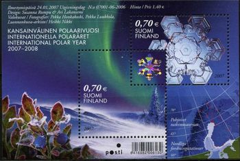 オーロラと雪の結晶（フィンランド、2007年）
