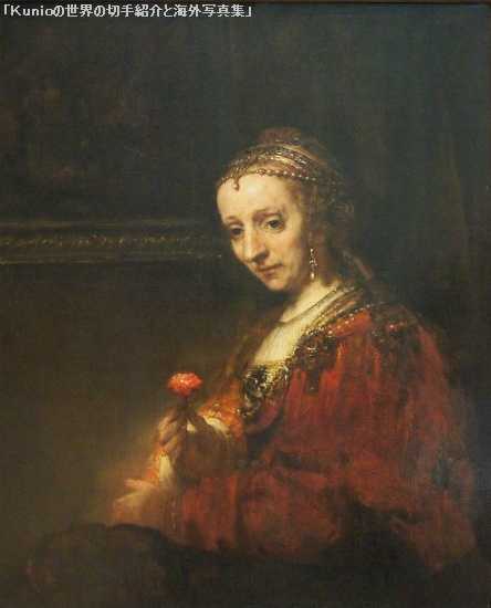 レンブラント|Woman with a Pink, early 1660s